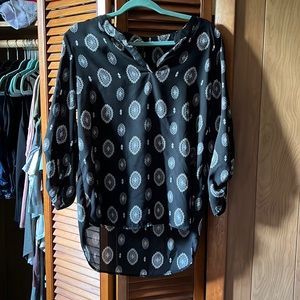 3/4 patterned shirt